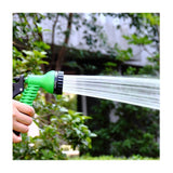 Garden hose nozzle with connector and tap adapter.