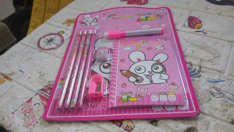 Wooden pencils and sharpener set for kids, includes eraser and diary.